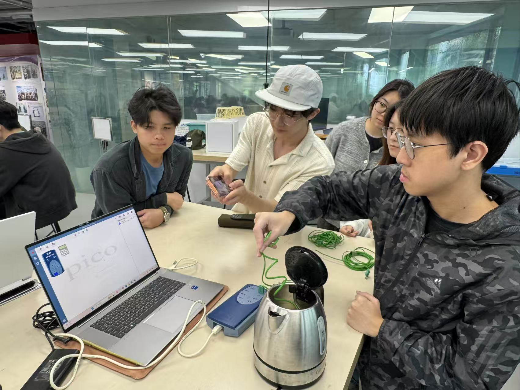 Students troubleshooting and iterating after hitting roadblocks