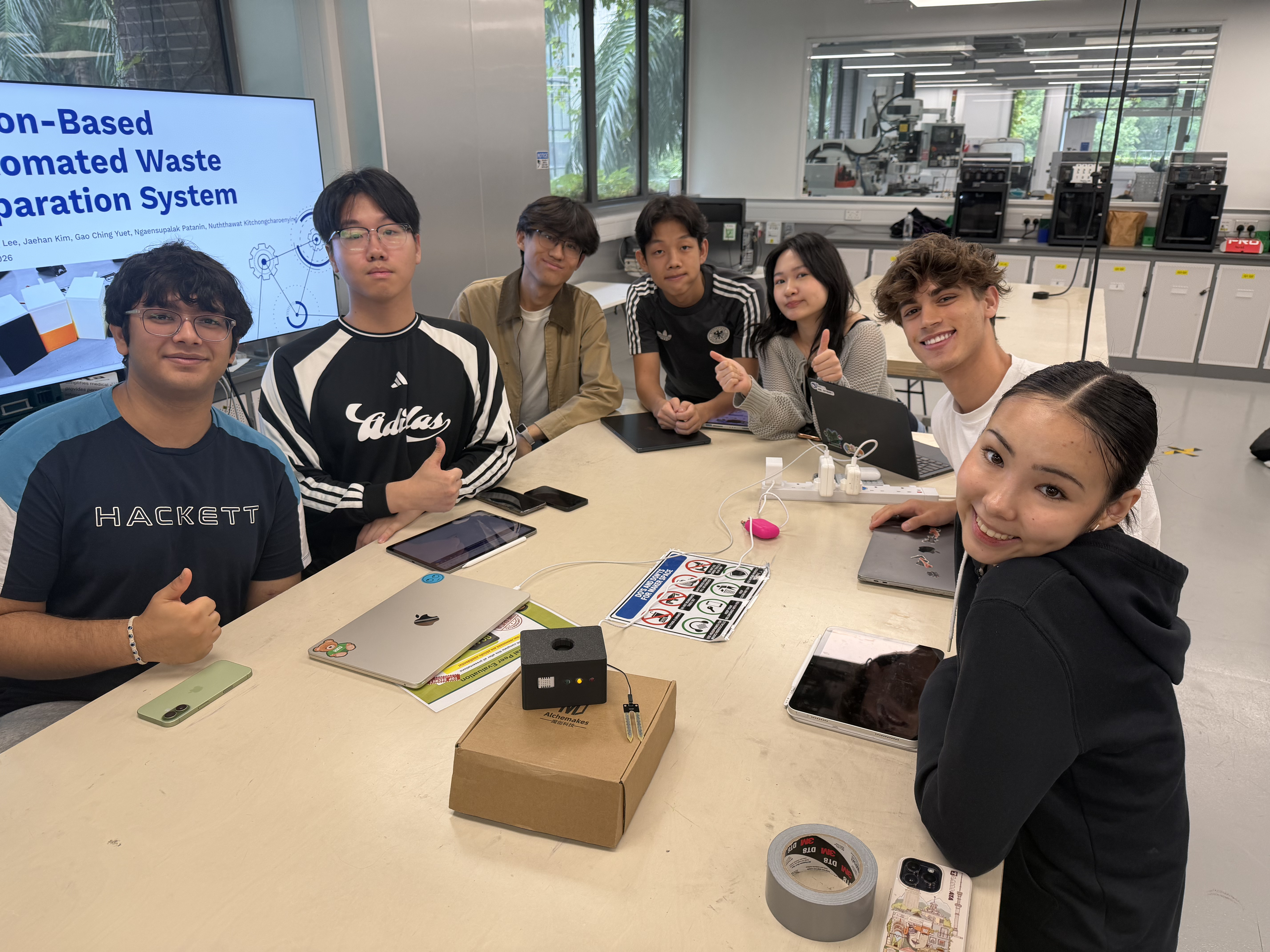 Student team is posing with their prototype