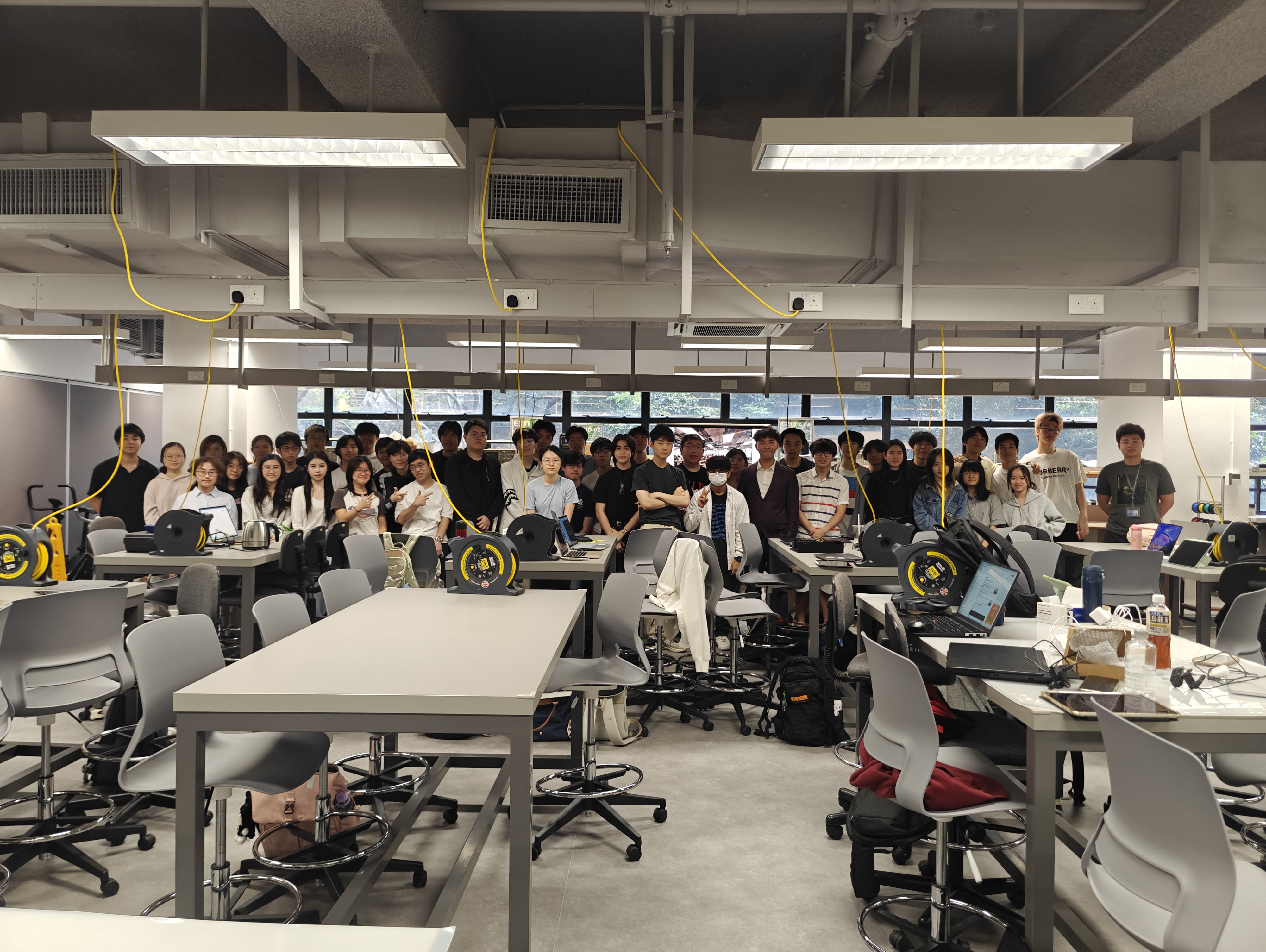 Full team photo showing collaboration over a long project